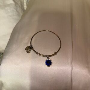 Alex and Ani Gold Bracelet with Blue Charm